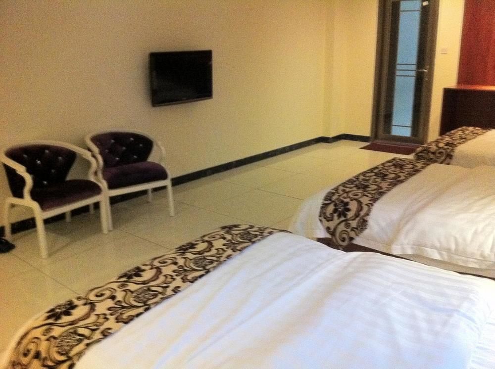 Guoxing Business Hotel Чжаоцин Экстерьер фото