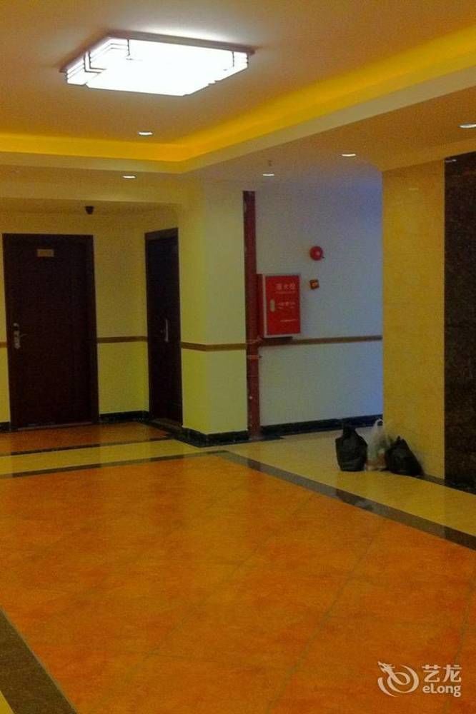 Guoxing Business Hotel Чжаоцин Экстерьер фото