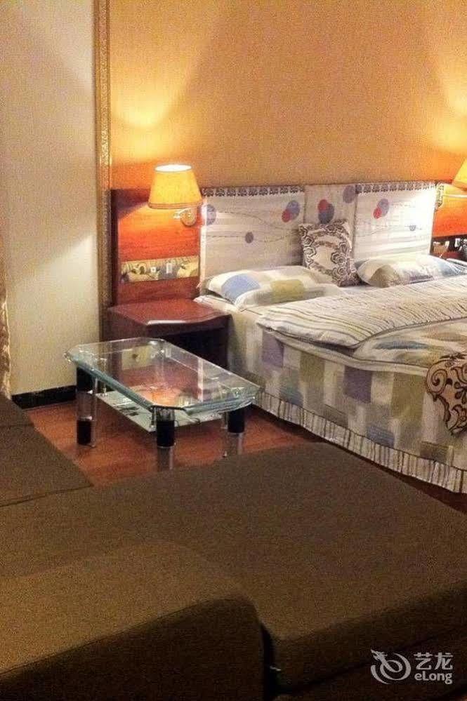 Guoxing Business Hotel Чжаоцин Экстерьер фото